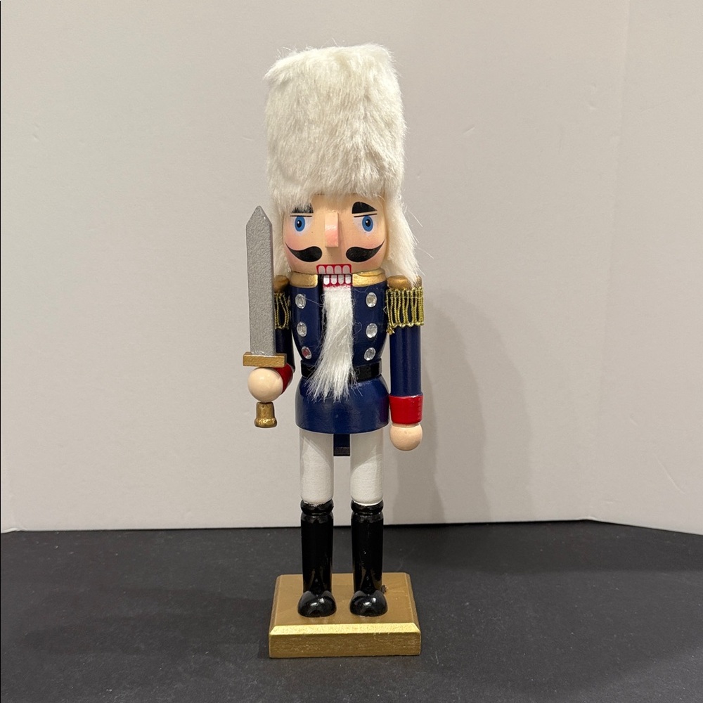 Nutcracker wooden Blue and White with sword and furry hat
